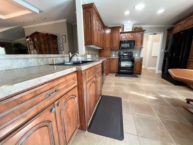 Turnkey 3-Bd, 2-Bath Gem! This beautifully furnished 2007 home on Del Tura Golf and Country Club in Florida - for sale on GolfHomes.com, golf home, golf lot
