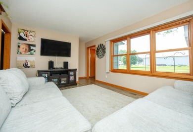 Welcome to this move-in ready 1.5-story home offering 4 bedrooms on Waverly Municipal Golf Course in Iowa - for sale on GolfHomes.com, golf home, golf lot