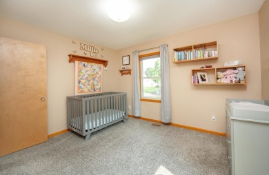 Welcome to this move-in ready 1.5-story home offering 4 bedrooms on Waverly Municipal Golf Course in Iowa - for sale on GolfHomes.com, golf home, golf lot