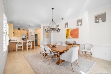 Exuding timeless sophistication and modern comfort, this elegant on Willoughby Golf Club in Florida - for sale on GolfHomes.com, golf home, golf lot