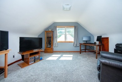 Welcome to this move-in ready 1.5-story home offering 4 bedrooms on Waverly Municipal Golf Course in Iowa - for sale on GolfHomes.com, golf home, golf lot