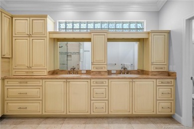 Exuding timeless sophistication and modern comfort, this elegant on Willoughby Golf Club in Florida - for sale on GolfHomes.com, golf home, golf lot