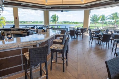 Luxury living in upper-floor Veranda with water and golf views on Heritage Bay Golf Course in Florida - for sale on GolfHomes.com, golf home, golf lot