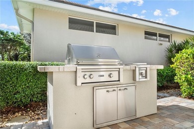 Exuding timeless sophistication and modern comfort, this elegant on Willoughby Golf Club in Florida - for sale on GolfHomes.com, golf home, golf lot