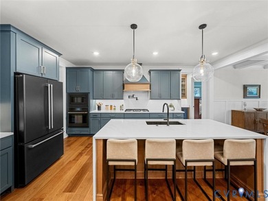 This 2022 Clay Street Builders Parade of Homes award-winning on Lake Chesdin Golfers Club in Virginia - for sale on GolfHomes.com, golf home, golf lot