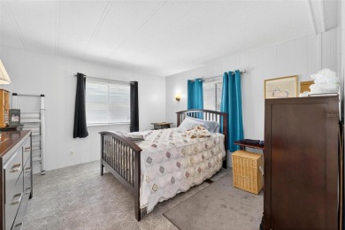 Charming 2-Bedroom Home with Co-op Share in Active 55+ on Lakes at Leesburg Golf Course in Florida - for sale on GolfHomes.com, golf home, golf lot