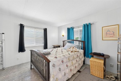 Charming 2-Bedroom Home with Co-op Share in Active 55+ on Lakes at Leesburg Golf Course in Florida - for sale on GolfHomes.com, golf home, golf lot