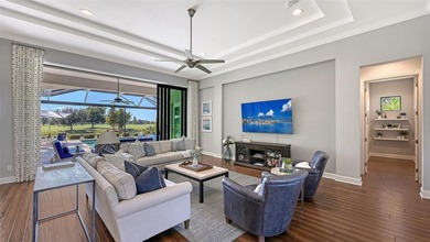 Set in Lakewood Ranch's Country Club East, this exceptional on Ritz-Carlton Members Golf Club in Florida - for sale on GolfHomes.com, golf home, golf lot