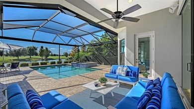Set in Lakewood Ranch's Country Club East, this exceptional on Ritz-Carlton Members Golf Club in Florida - for sale on GolfHomes.com, golf home, golf lot