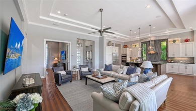 Set in Lakewood Ranch's Country Club East, this exceptional on Ritz-Carlton Members Golf Club in Florida - for sale on GolfHomes.com, golf home, golf lot