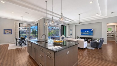 Set in Lakewood Ranch's Country Club East, this exceptional on Ritz-Carlton Members Golf Club in Florida - for sale on GolfHomes.com, golf home, golf lot