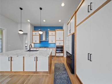 This beautiful custom-built 1.5-story home in WaterCrest Landing on Falcon Ridge Golf Course in Kansas - for sale on GolfHomes.com, golf home, golf lot