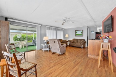 Charming 2-Bedroom Home with Co-op Share in Active 55+ on Lakes at Leesburg Golf Course in Florida - for sale on GolfHomes.com, golf home, golf lot
