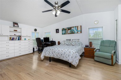 This cute and charming 2 bedroom, 2 bath manufactured home is on Maple Leaf Golf and Country Club in Florida - for sale on GolfHomes.com, golf home, golf lot