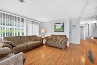 Charming 2-Bedroom Home with Co-op Share in Active 55+ on Lakes at Leesburg Golf Course in Florida - for sale on GolfHomes.com, golf home, golf lot