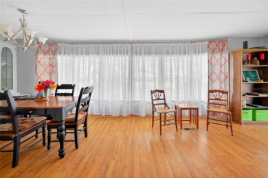 Charming 2-Bedroom Home with Co-op Share in Active 55+ on Lakes at Leesburg Golf Course in Florida - for sale on GolfHomes.com, golf home, golf lot