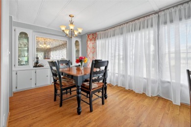 Charming 2-Bedroom Home with Co-op Share in Active 55+ on Lakes at Leesburg Golf Course in Florida - for sale on GolfHomes.com, golf home, golf lot