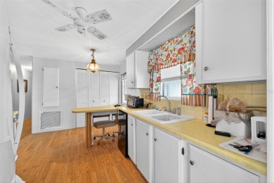 Charming 2-Bedroom Home with Co-op Share in Active 55+ on Lakes at Leesburg Golf Course in Florida - for sale on GolfHomes.com, golf home, golf lot