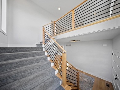 This beautiful custom-built 1.5-story home in WaterCrest Landing on Falcon Ridge Golf Course in Kansas - for sale on GolfHomes.com, golf home, golf lot