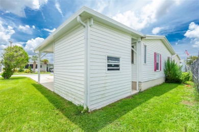 This cute and charming 2 bedroom, 2 bath manufactured home is on Maple Leaf Golf and Country Club in Florida - for sale on GolfHomes.com, golf home, golf lot