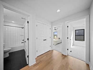 This beautiful custom-built 1.5-story home in WaterCrest Landing on Falcon Ridge Golf Course in Kansas - for sale on GolfHomes.com, golf home, golf lot