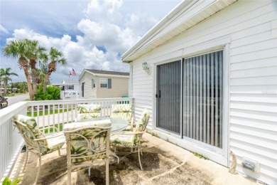 This cute and charming 2 bedroom, 2 bath manufactured home is on Maple Leaf Golf and Country Club in Florida - for sale on GolfHomes.com, golf home, golf lot