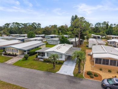 Charming 2-Bedroom Home with Co-op Share in Active 55+ on Lakes at Leesburg Golf Course in Florida - for sale on GolfHomes.com, golf home, golf lot