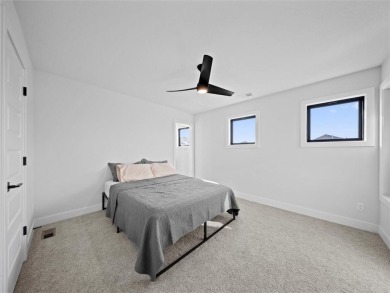 This beautiful custom-built 1.5-story home in WaterCrest Landing on Falcon Ridge Golf Course in Kansas - for sale on GolfHomes.com, golf home, golf lot