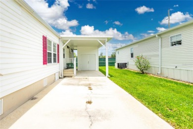 This cute and charming 2 bedroom, 2 bath manufactured home is on Maple Leaf Golf and Country Club in Florida - for sale on GolfHomes.com, golf home, golf lot