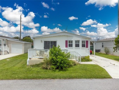 This cute and charming 2 bedroom, 2 bath manufactured home is on Maple Leaf Golf and Country Club in Florida - for sale on GolfHomes.com, golf home, golf lot