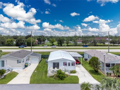 This cute and charming 2 bedroom, 2 bath manufactured home is on Maple Leaf Golf and Country Club in Florida - for sale on GolfHomes.com, golf home, golf lot