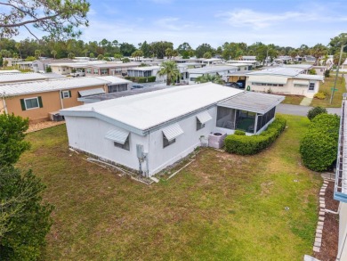 Charming 2-Bedroom Home with Co-op Share in Active 55+ on Lakes at Leesburg Golf Course in Florida - for sale on GolfHomes.com, golf home, golf lot