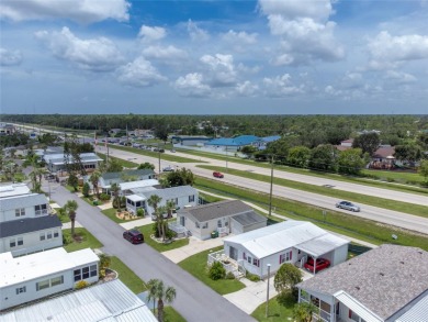 This cute and charming 2 bedroom, 2 bath manufactured home is on Maple Leaf Golf and Country Club in Florida - for sale on GolfHomes.com, golf home, golf lot