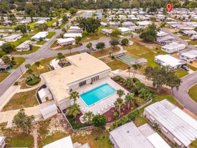 Charming 2-Bedroom Home with Co-op Share in Active 55+ on Lakes at Leesburg Golf Course in Florida - for sale on GolfHomes.com, golf home, golf lot