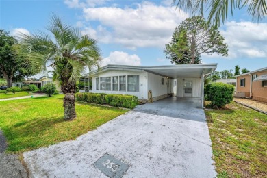 Charming 2-Bedroom Home with Co-op Share in Active 55+ on Lakes at Leesburg Golf Course in Florida - for sale on GolfHomes.com, golf home, golf lot