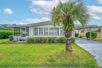 Charming 2-Bedroom Home with Co-op Share in Active 55+ on Lakes at Leesburg Golf Course in Florida - for sale on GolfHomes.com, golf home, golf lot