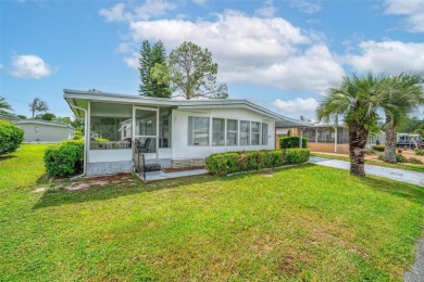 Charming 2-Bedroom Home with Co-op Share in Active 55+ on Lakes at Leesburg Golf Course in Florida - for sale on GolfHomes.com, golf home, golf lot
