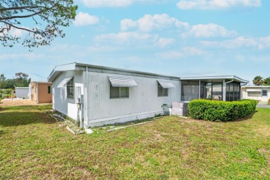 Charming 2-Bedroom Home with Co-op Share in Active 55+ on Lakes at Leesburg Golf Course in Florida - for sale on GolfHomes.com, golf home, golf lot