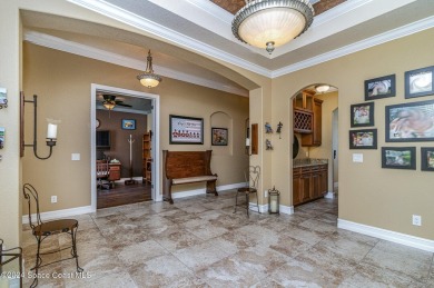 This stunning 3-bedroom, 2-bathroom custom home, complete with on Sherwood Golf Club in Florida - for sale on GolfHomes.com, golf home, golf lot