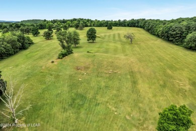 This spectacular property situated on 86 ACRES features a 9 hole on Morgan Hills in Pennsylvania - for sale on GolfHomes.com, golf home, golf lot