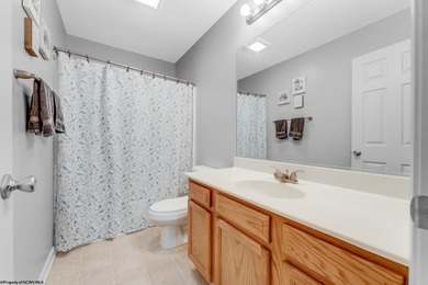 Discover your perfect retreat in this move-in-ready townhome on Meadow Ponds Golf and Country Club in West Virginia - for sale on GolfHomes.com, golf home, golf lot