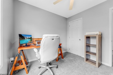 Discover your perfect retreat in this move-in-ready townhome on Meadow Ponds Golf and Country Club in West Virginia - for sale on GolfHomes.com, golf home, golf lot