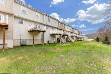 Discover your perfect retreat in this move-in-ready townhome on Meadow Ponds Golf and Country Club in West Virginia - for sale on GolfHomes.com, golf home, golf lot