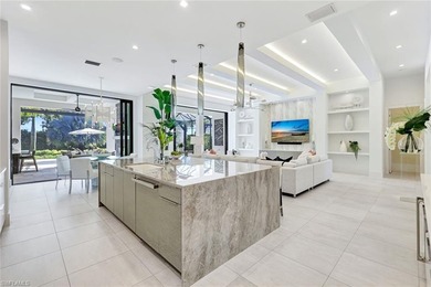 ELEVATED & LUXURIOUS This is a rare opportunity to own a on The Golf Club At Fiddlers Creek in Florida - for sale on GolfHomes.com, golf home, golf lot