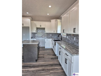 This one is a MUST SEE!  Contemporary Home with an Open Floor on Lincoln Trail Country Club in Kentucky - for sale on GolfHomes.com, golf home, golf lot