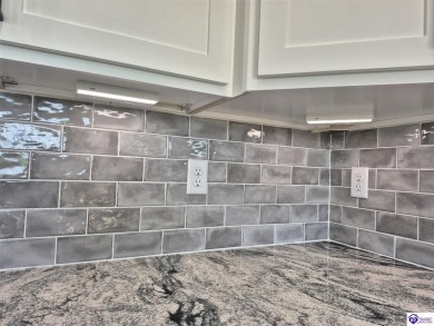 This one is a MUST SEE!  Contemporary Home with an Open Floor on Lincoln Trail Country Club in Kentucky - for sale on GolfHomes.com, golf home, golf lot