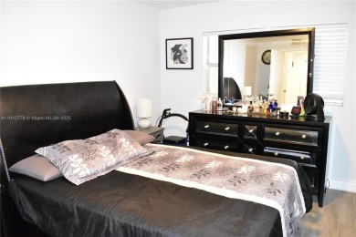Nice, first floor 1 bedroom apartment with renovated kitchen on Sunrise Lakes Phase III in Florida - for sale on GolfHomes.com, golf home, golf lot