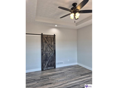 This one is a MUST SEE!  Contemporary Home with an Open Floor on Lincoln Trail Country Club in Kentucky - for sale on GolfHomes.com, golf home, golf lot