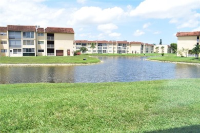 Nice, first floor 1 bedroom apartment with renovated kitchen on Sunrise Lakes Phase III in Florida - for sale on GolfHomes.com, golf home, golf lot