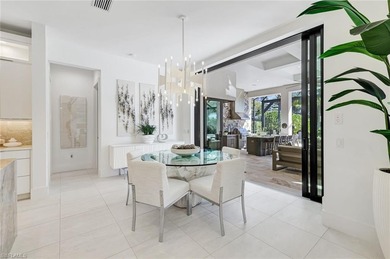 ELEVATED & LUXURIOUS This is a rare opportunity to own a on The Golf Club At Fiddlers Creek in Florida - for sale on GolfHomes.com, golf home, golf lot